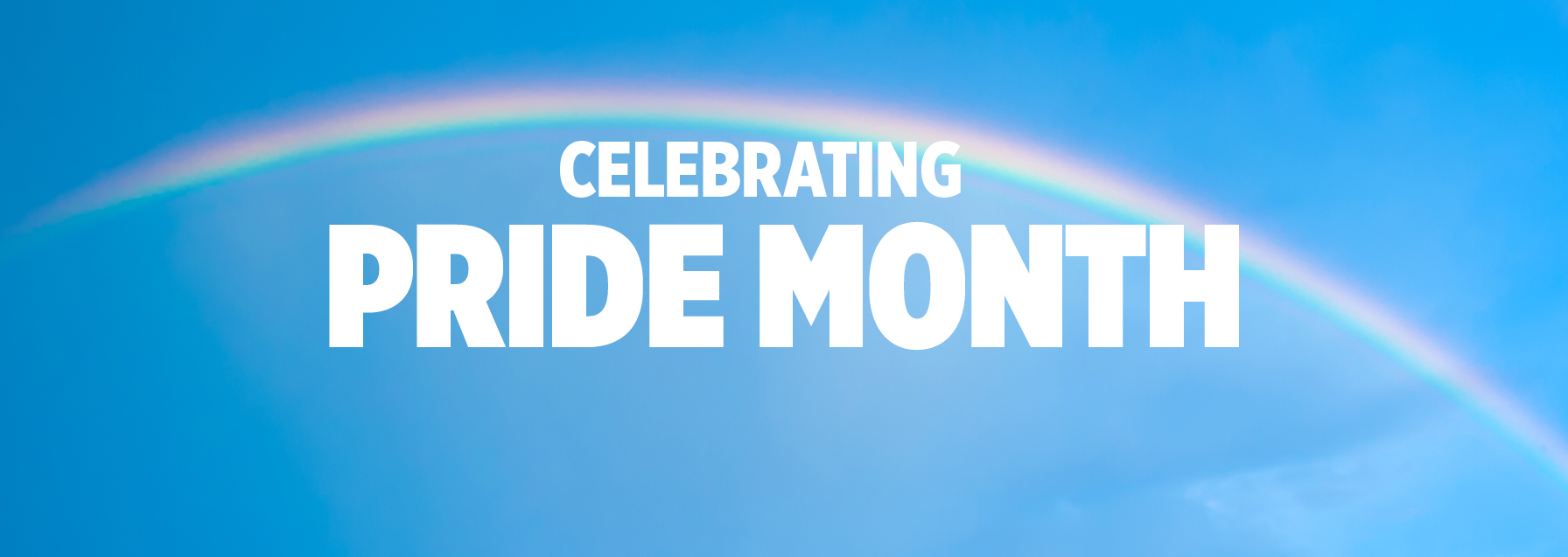 A vibrant blue sky background features a full rainbow arc. White text overlays the image, reading: CELEBRATING PRIDE MONTH.